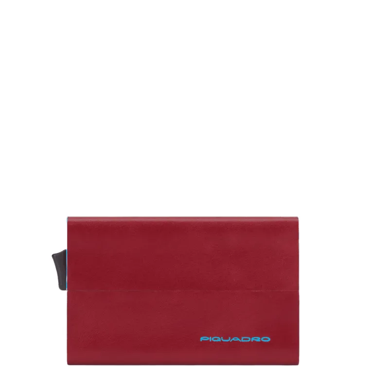 Credit card holder with sliding extraction and flap back...