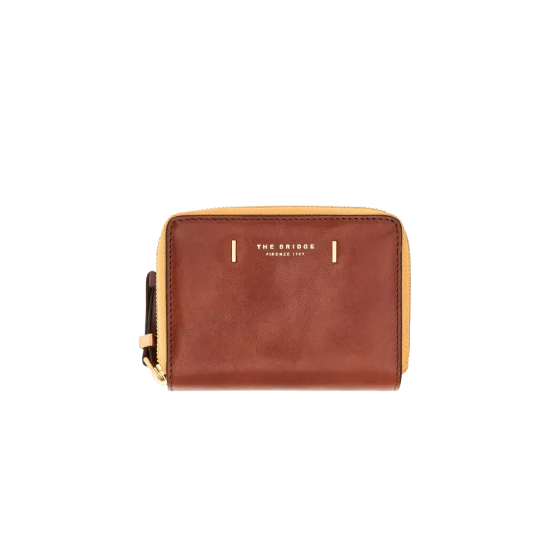 Medium women's wallet with external zipped pocket The...