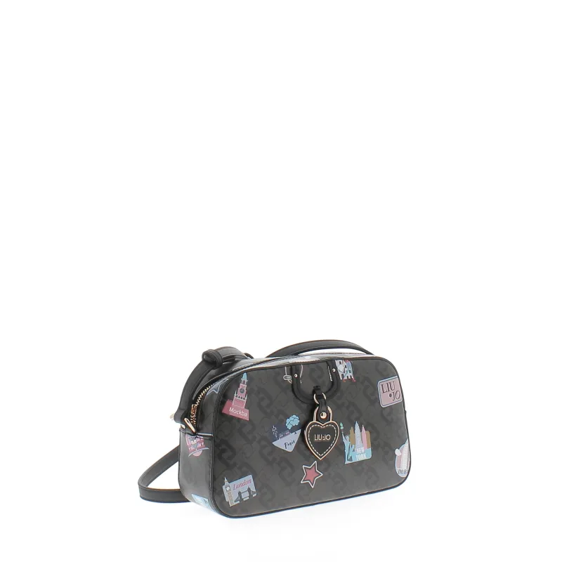 disney x coach dinky with mixed dalmatian print
